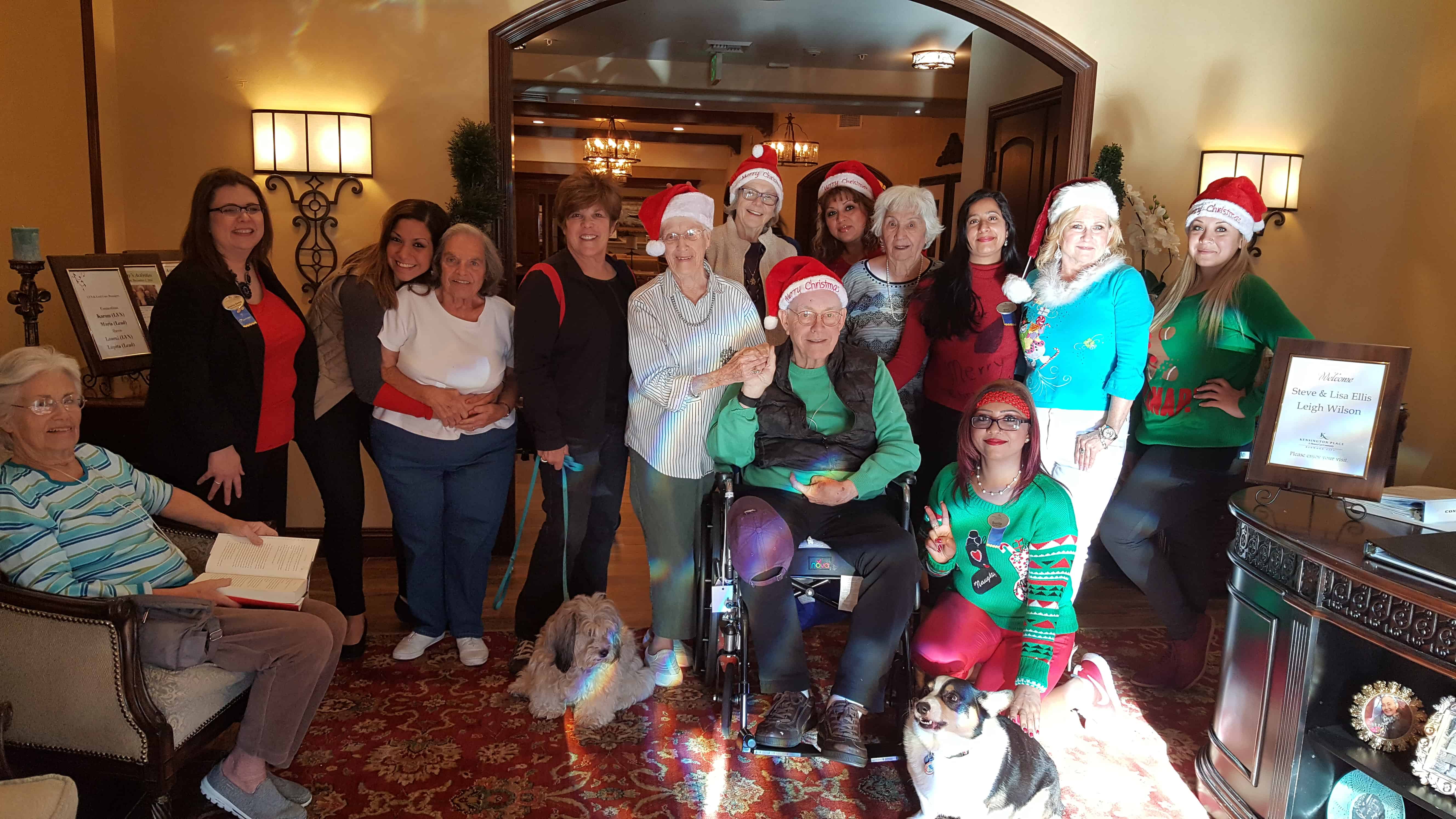 Kensington Place Redwood City residents and team members wearing ugly holiday sweaters