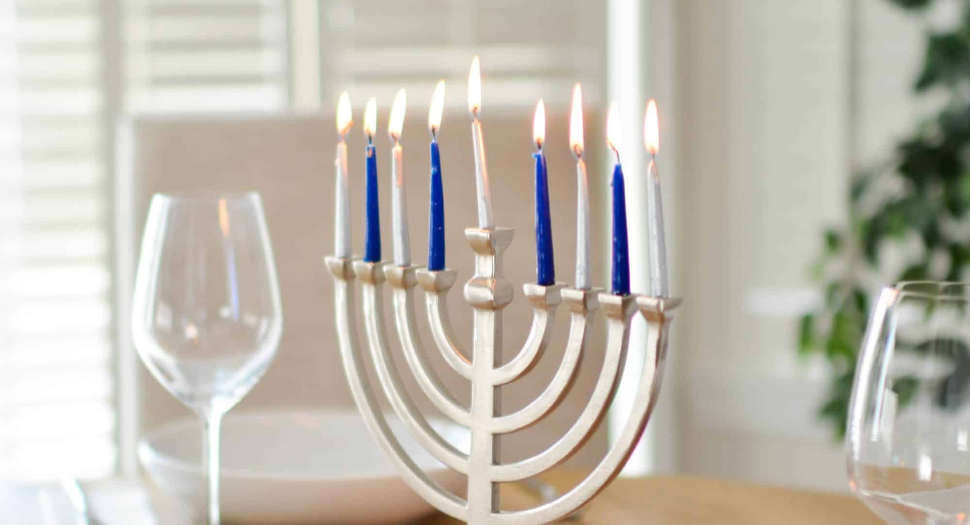menorah lit for hanukkah celebration