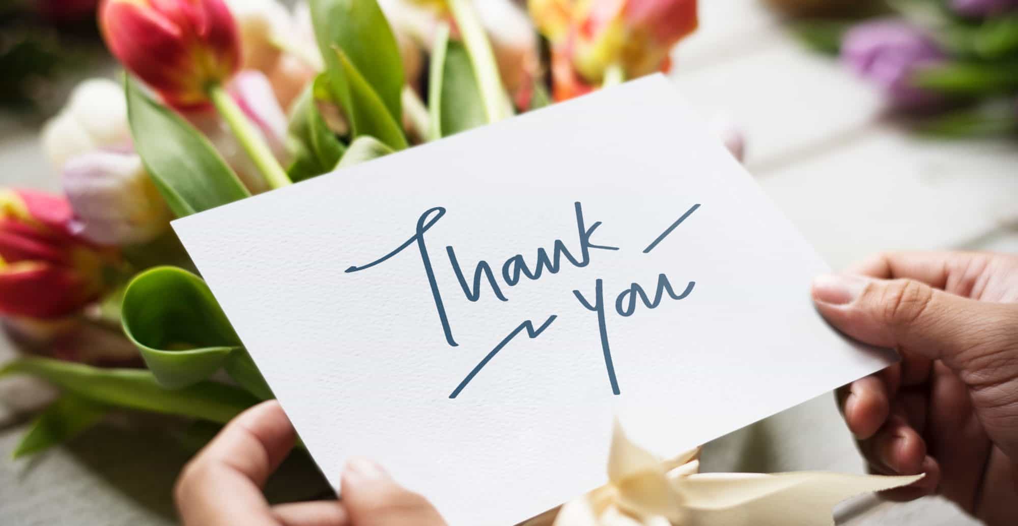 thank you card and bouquet of flowers