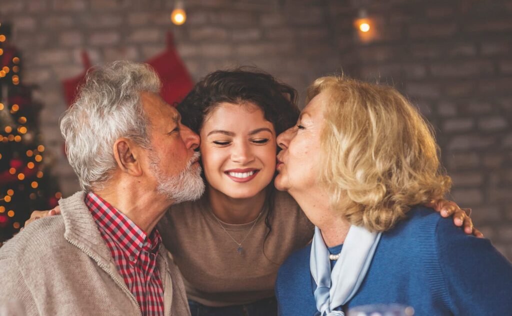 A family is having a christmas dinner together.