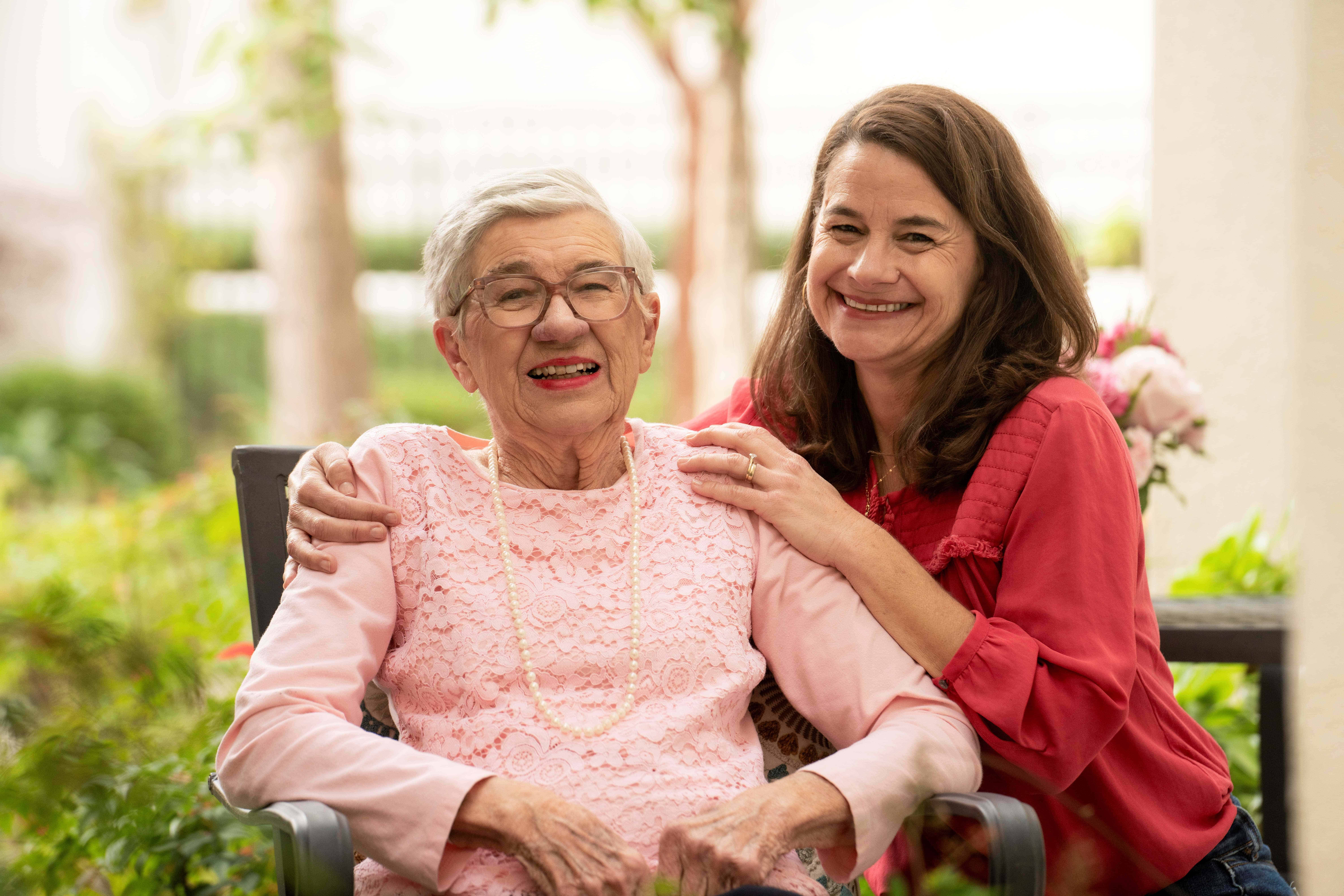 woman sitting with her older mom