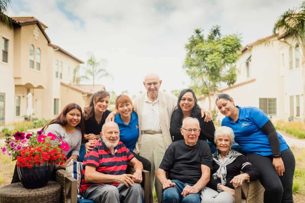 A group of people sitting on a patio