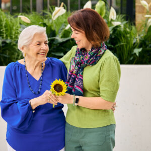 elderly mother and daughter