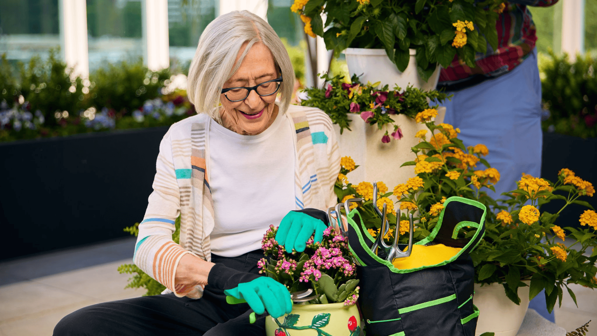 Senior lady gardening on the patio
