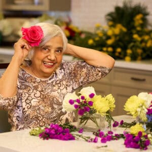 senior lady working on flower arrangements